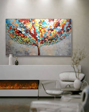 a luxurious painting on a wall above a fireplace