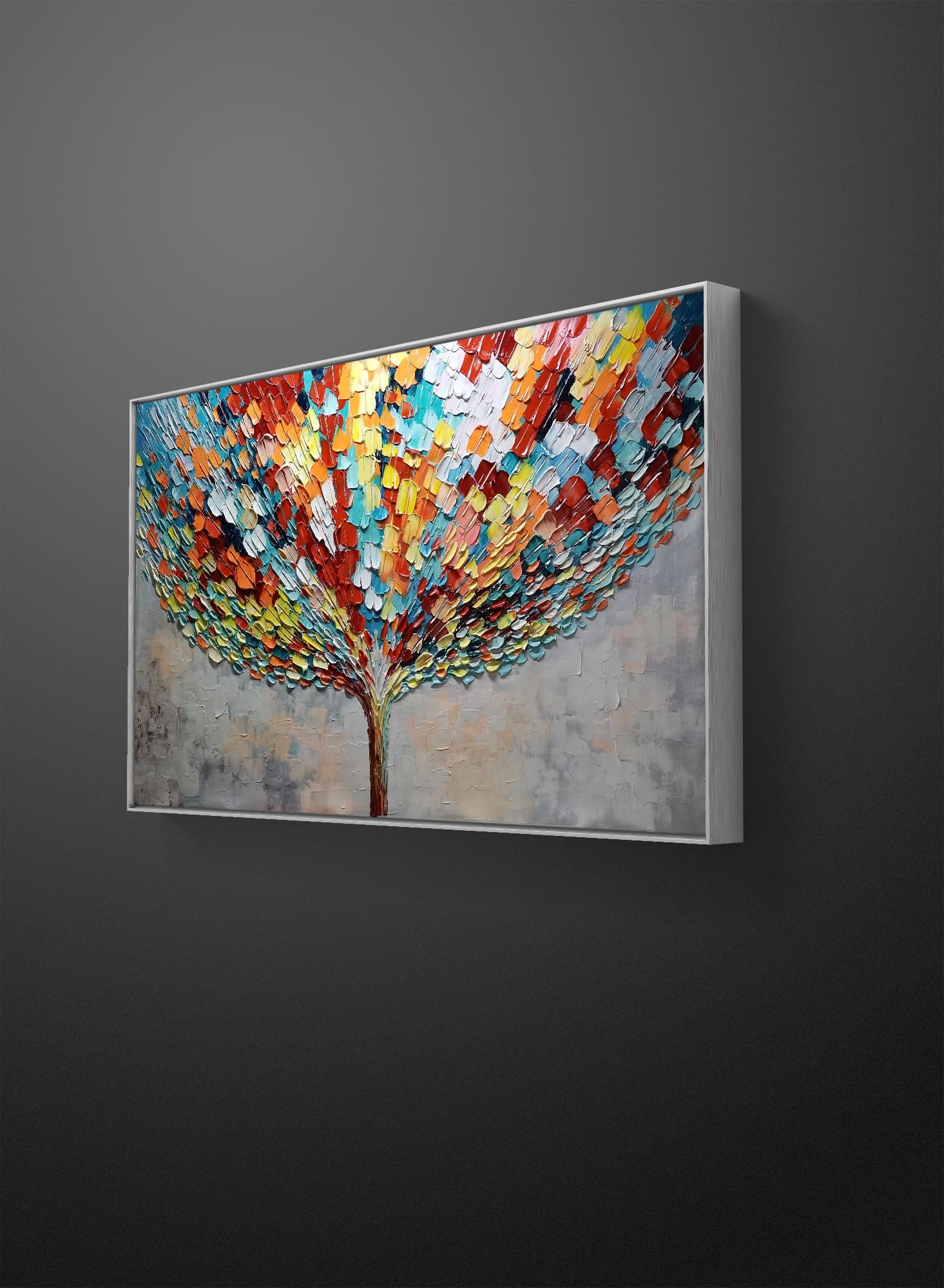a painting of a colorful tree hanging on a wall