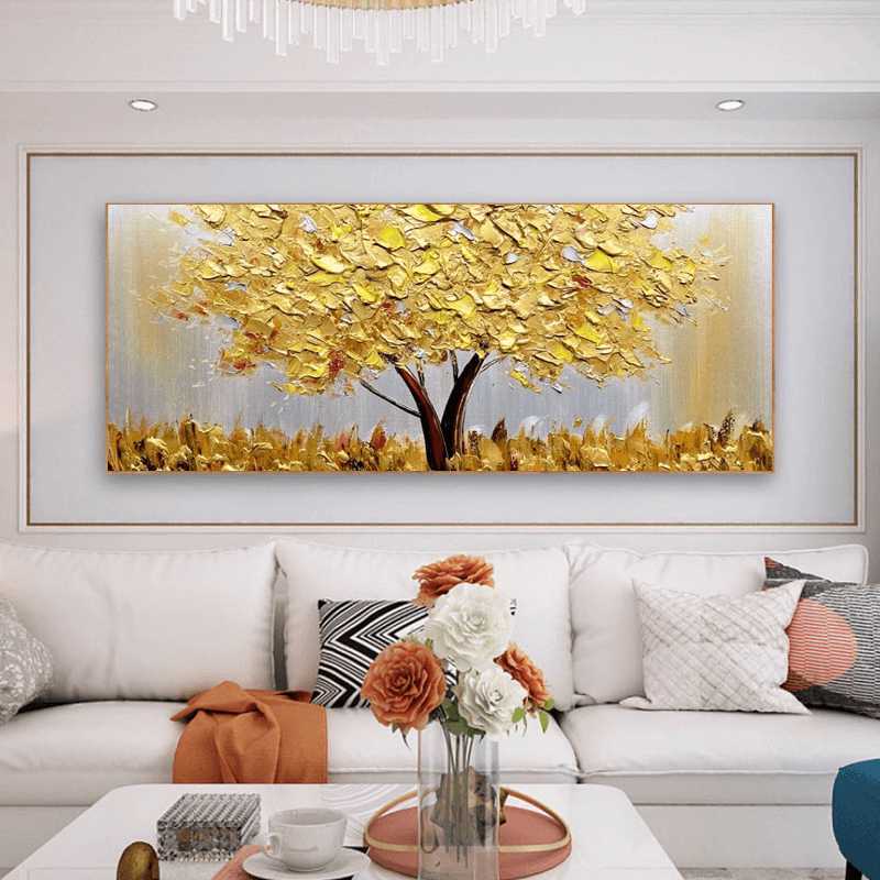 Framed abstract painting of a tree with yellow leaves in a living room setting.