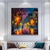 Framed painting of a city street scene with people walking, hanging above a white sofa in a living room.