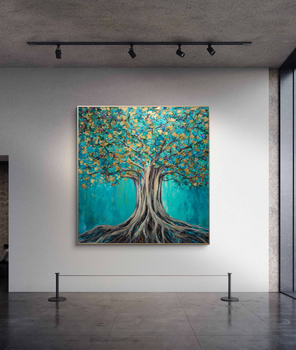 Artistic depiction of a tree with blue and gold leaves on a white wall.