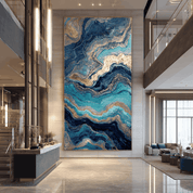 Modern interior with a large abstract blue and gold painting on a wall.