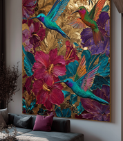Colorful artwork of hummingbirds and flowers on a wall in a living room.