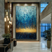 Abstract painting in a modern interior setting with decorative elements.