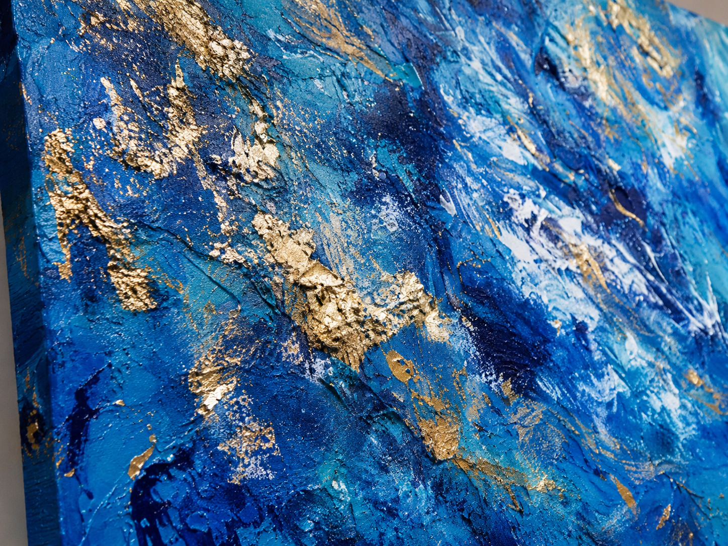 Textured_waves_of_blue_and_gold_radikal_homes.png