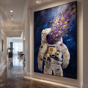 Large painting of an astronaut in a space suit on a wall in a modern hallway.
